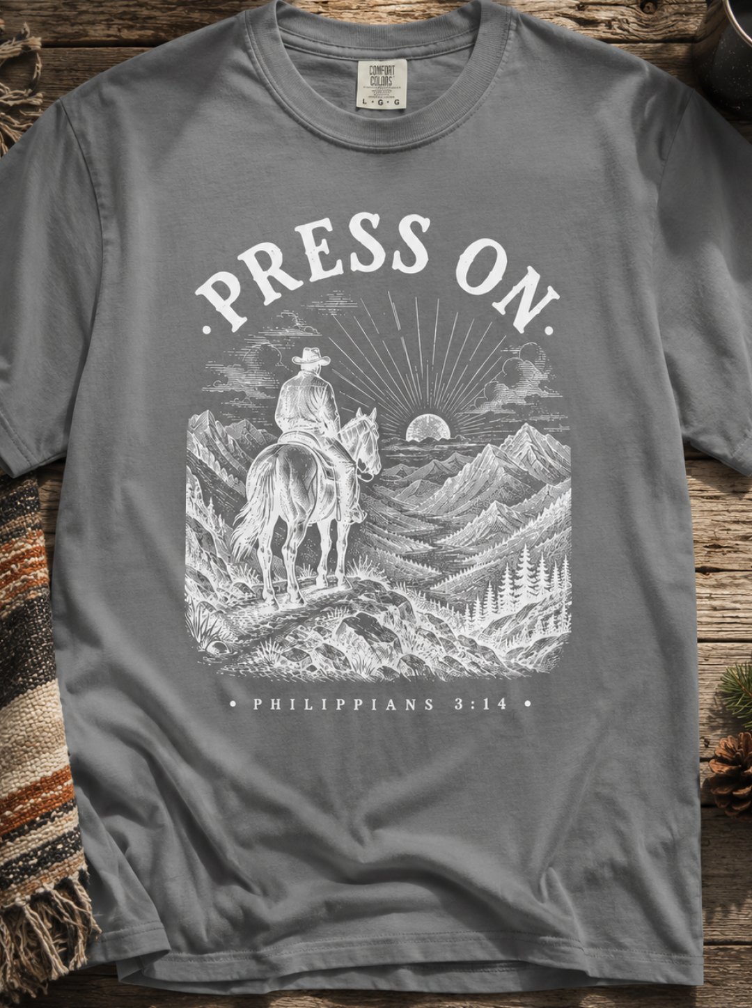 Press On T‑Shirt — Christian Cowboy Mountain Graphic (Philippians 3:14)